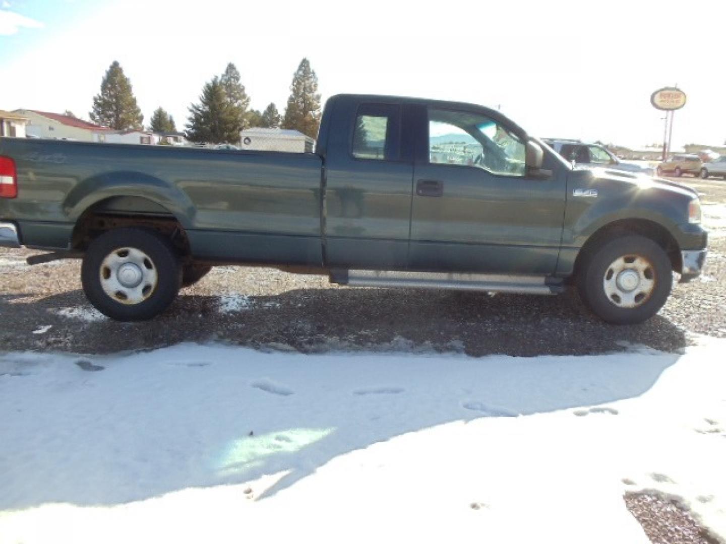 2004 Green /Gray Ford F-150 XL (1FTVX14504N) with an V8, 5.4L; SOHC engine, Automatic transmission, located at 5465 Highway 2 W., Columbia Falls, MT, 59912, (406) 892-4407, 48.352188, -114.240929 - Cruise control AC Tilt Wheel Towing - Photo#9